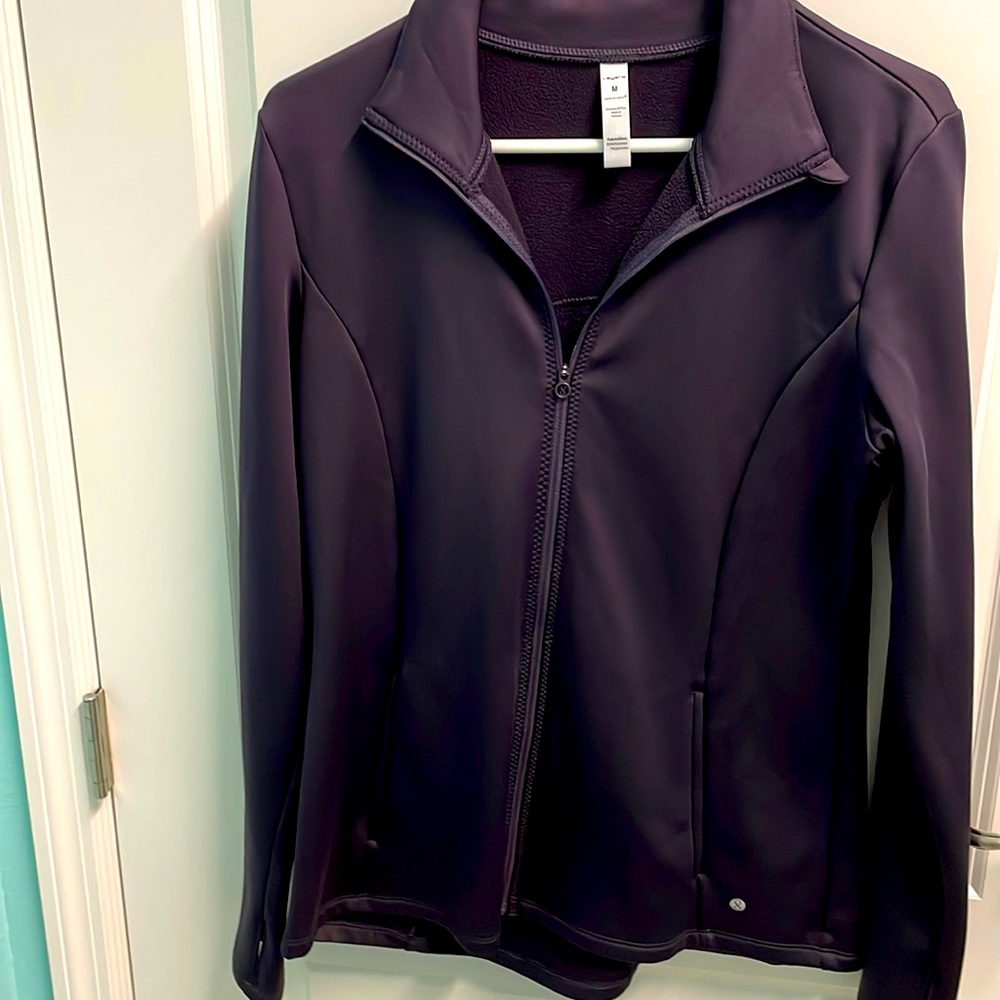 Eggplant color dry fit jacket! Thumb cut outs.
